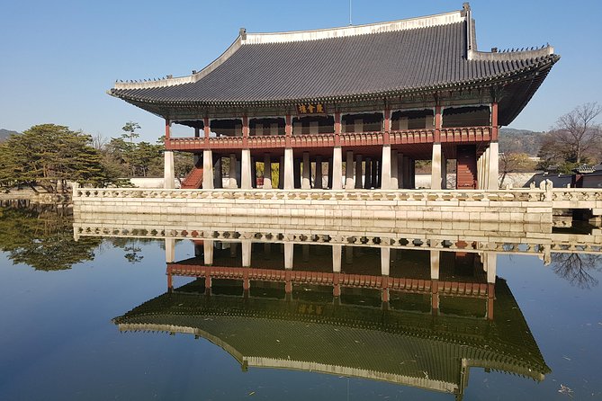 Best Walking Tour to Gyeongbok Palace Bukchon Hanok Village - The walk between palaces, then the uphill switch into Bukchon