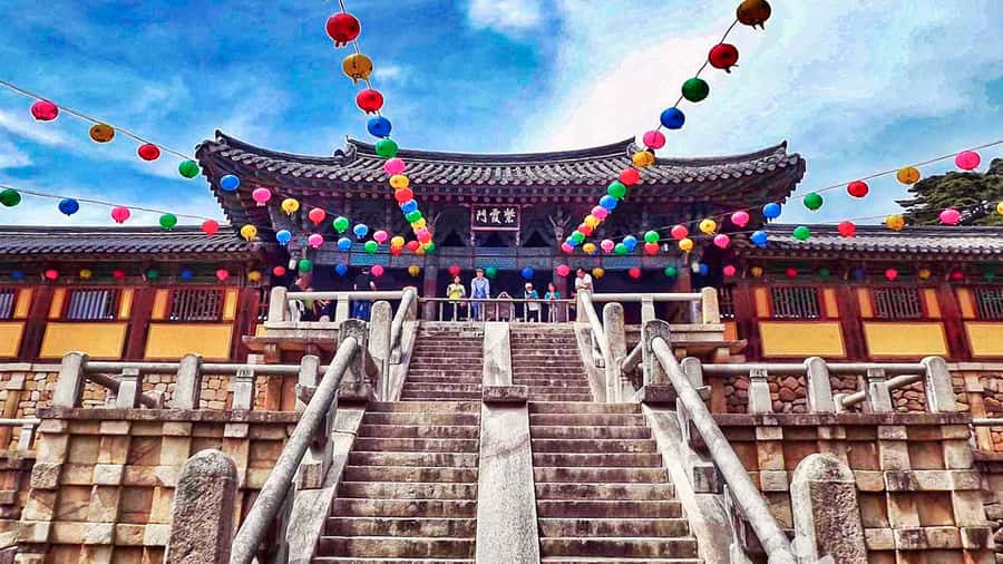 Busan: 7 Highlights Gyeongju City One Day Tour - Hwangnidan-gil’s pedestrian lane and the 10 won bread mission