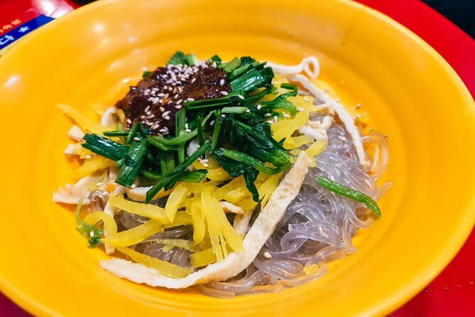 Busan: Food Crawl with Fish Market, Soju Tents & Local Snacks - Busan at night, where food and harbor life overlap