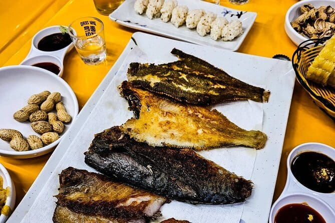 Busan: Food Crawl with Fish Market, Soju Tents & Local Snacks - Yeongdodaegyo Bridge: pojangmacha soju tents by docked boats