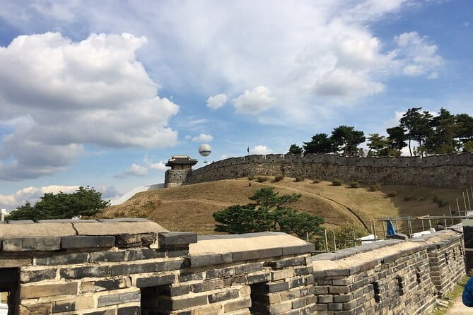Day Tour of Suwon Hwaseong Fortress Starfield Waujeongsa Temple - Waujeongsa Temple: Statues, Stone Details, and a Calm Reset