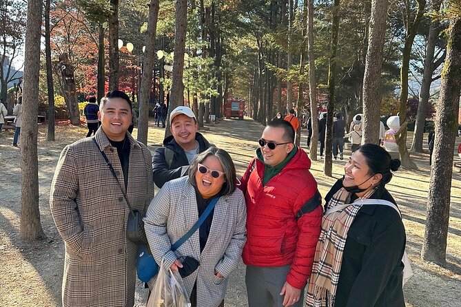 Four Seasons of Nami Island with Garden of Morning Calm Tour - Nami Island morning walks: the half-moon shape and the no-phone-poles detail