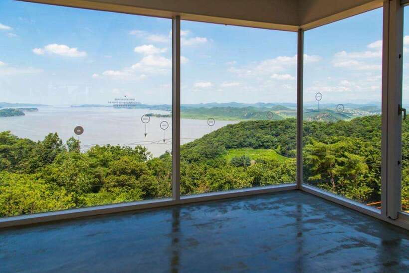 From Seoul: Aegibong Starbucks Observatory & DMZ View - Aegibong Peace Eco Park: Exhibition Hall Windows, River Videos, and a 112-Meter Walk