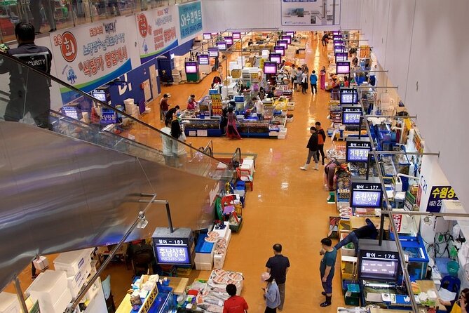 Full-Day Culinary Tour of Seoul Including Noryangjin Fish Market and Korean BBQ Dinner - Kwangjang Market street food and what to look for