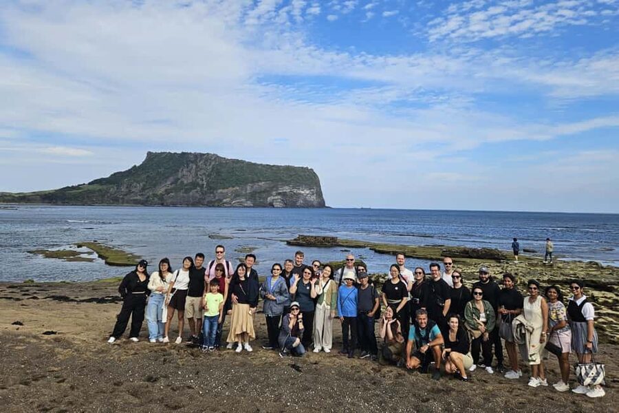 Jeju Island: Full-Day East Jeju Bus Tour with Entry Fees - Gwangchigi Beach at low tide: the green-rock postcard