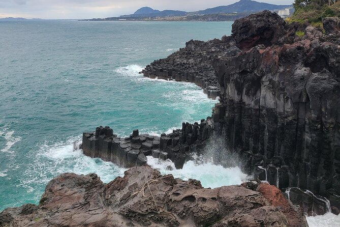 Jeju island Southern Unesco Mt.halla ONE day Bus Tour - Stop 3: Daepo Haean Jusangjeolli Cliffs, hexagonal columns from lava
