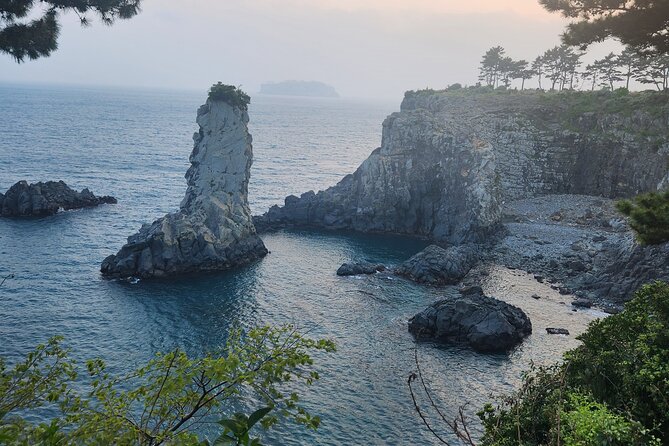 Jeju island Southern Unesco Mt.halla ONE day Bus Tour - Stop 5: Cheonjiyeon Falls, sky meets land in a walkable setting