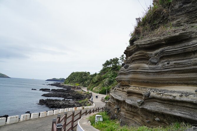 Jeju Premium Small Group UNESCO Day Tour - West Course - Stop 2, Sin-eomri Coastal Road: black rocks, cliffs, and lots of window-view time