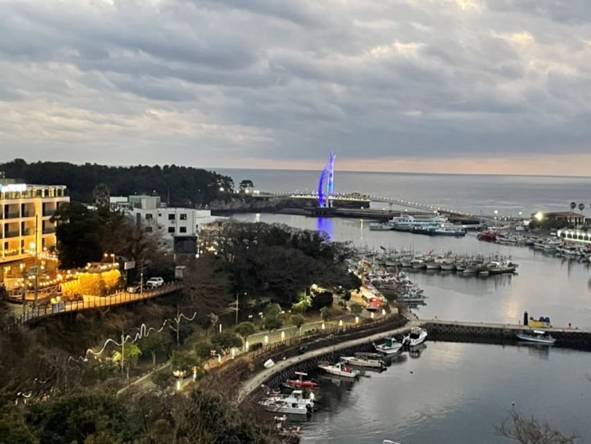 Jeju: Seogwipo City Walking Tours with Sunset - Saeseom island walk: 30 minutes on an uninhabited patch of nature
