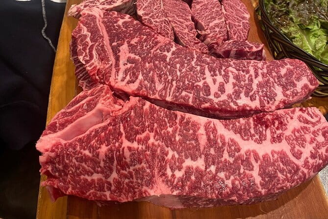 Majang Meat Market Experience: Private Tour with Han-woo Beef BBQ - Stop 1: Majang Meat Market, clean stalls with a serious reality check