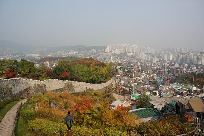 Private Seoul Wall Trekking [Inwangsan, Bugaksan, Naksan Park, N-Seoul Tower] - Bugaksan Seoul Fortress and the Blue House backdrop