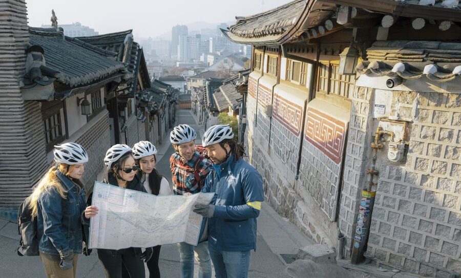 Seoul: City Highlights Morning eBike Tour - Bukchon Hanok Village, seeing the contrast up close