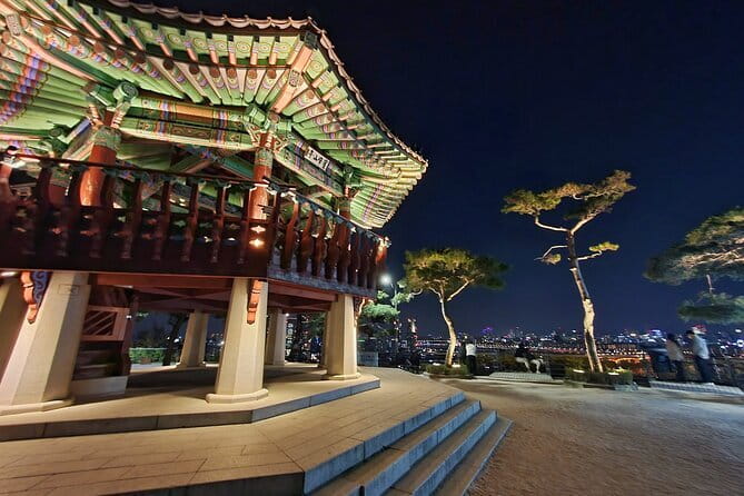 Seoul City Night View and Foodie Walking Tour - Naksan Park and the City Wall at night