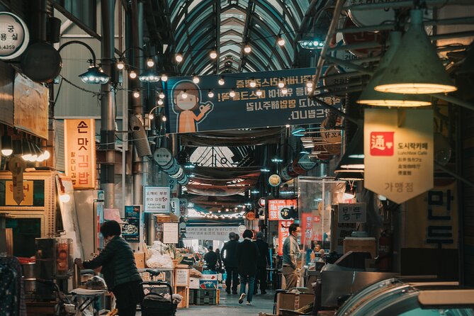 Seoul Night Palace & Market Food Tour with Vehicle - Jogyesa Temple: lanterns, Buddhism stories, and a calmer ending