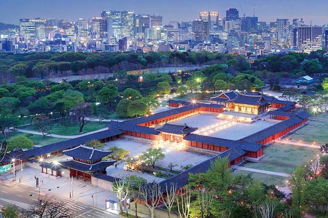 Seoul Night Tour (Gwangjang Market, Royal Palace and Naksan Park) - Cheonggyecheon Stream at night: calm center-city walking after the views