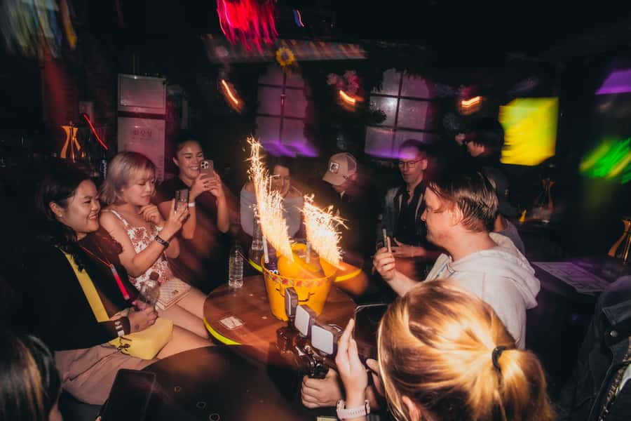 Seoul: Premium Pub Crawl with Limitless Drinks - Hosts, languages, and how the night stays friendly